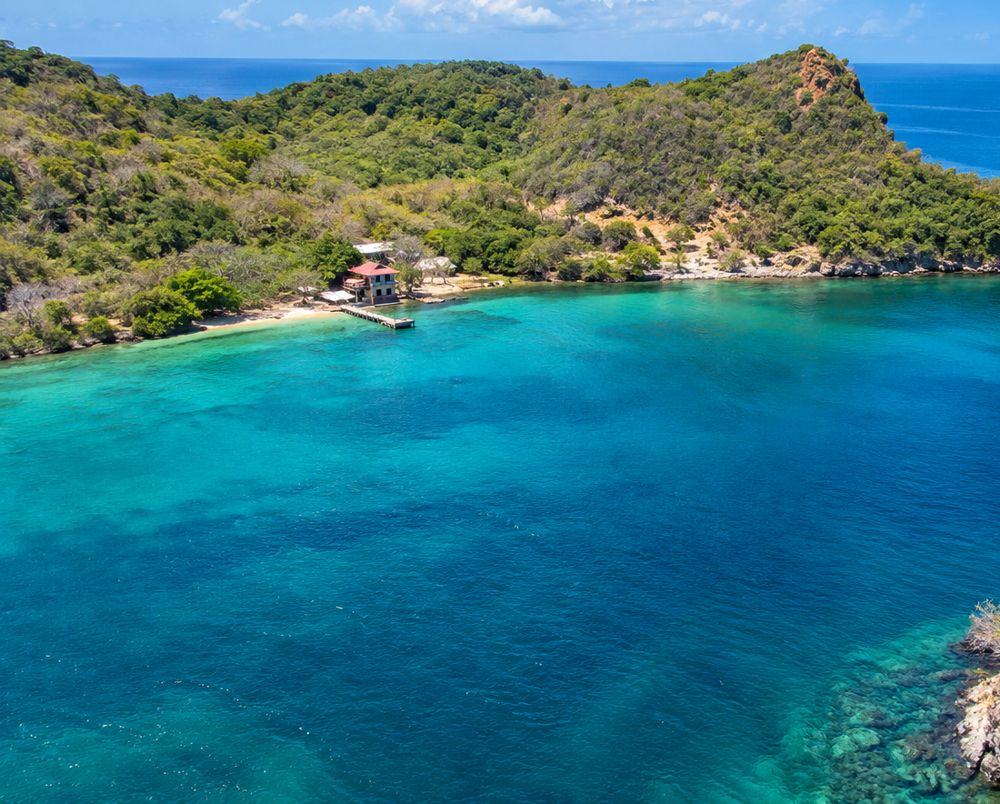 Clear blue water in a bay on Chacachacare island