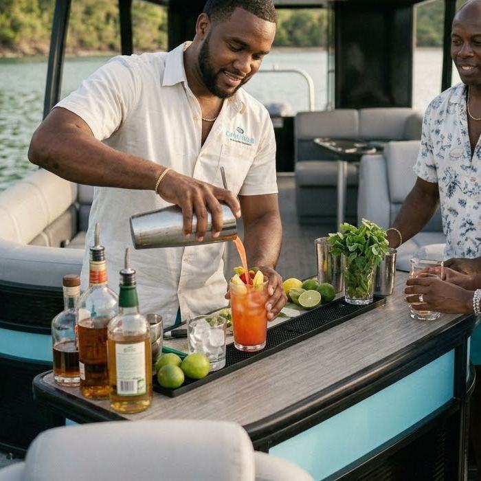 A bartender mixing drinks for guests